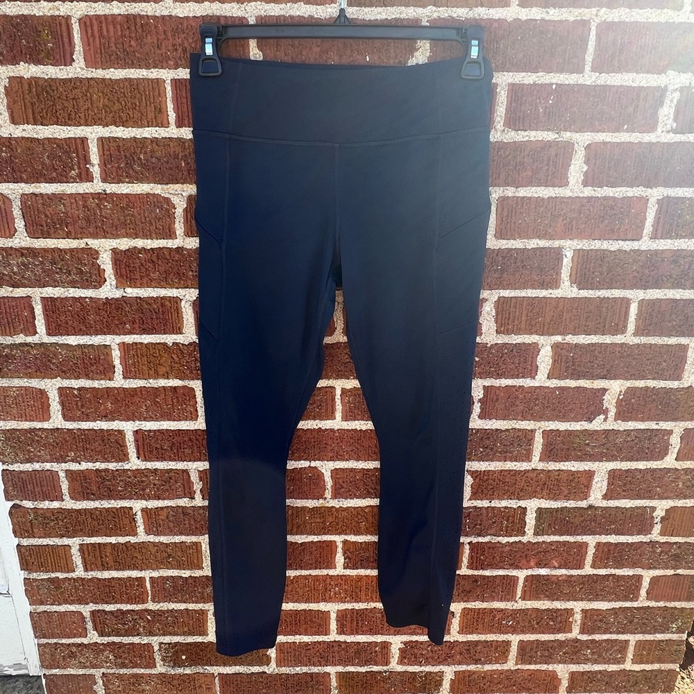 Athleta Ultimate Stash Tights Navy Blue Laser Cut Design size Medium
